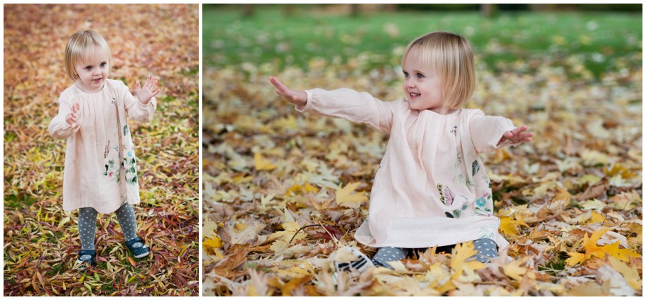little girl in leaves