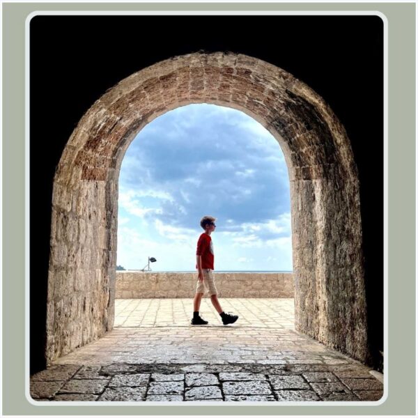 boy in arch