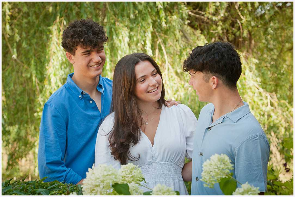 siblings in flowers 